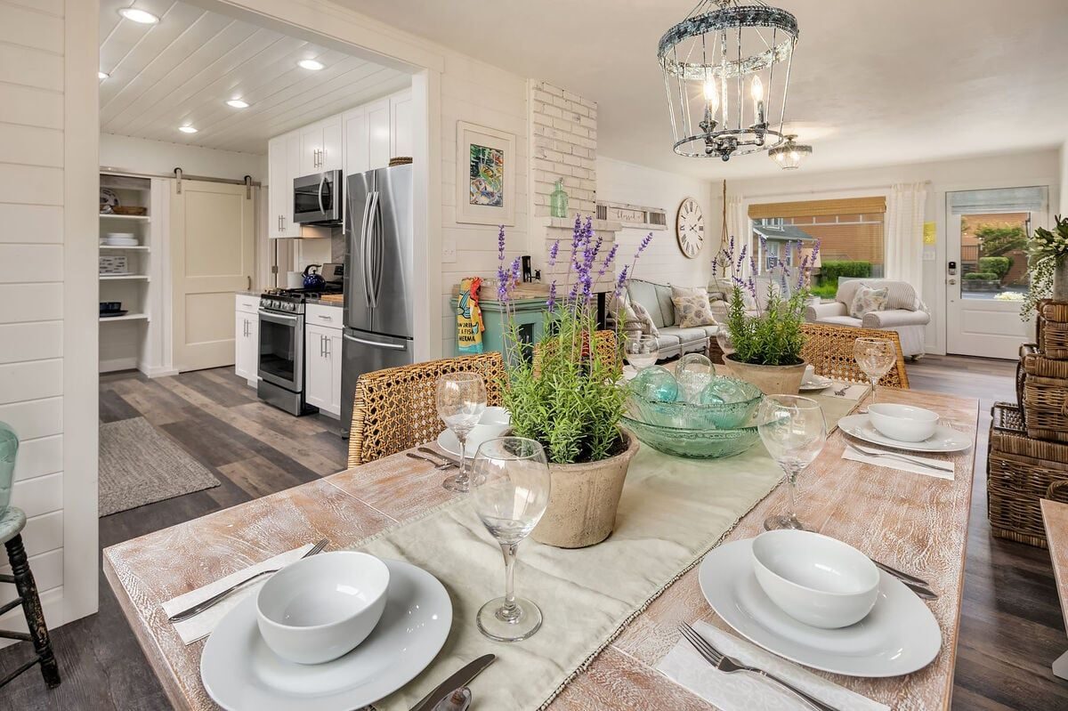 Granite kitchen with stainless appliances and dining for six